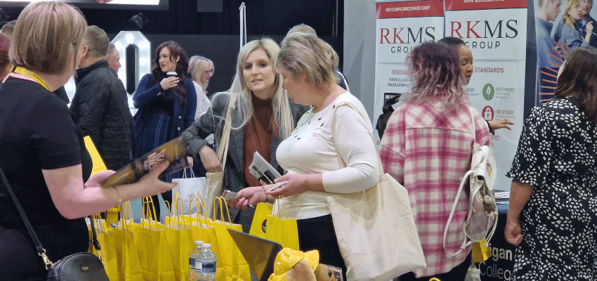 Image shows people networking at Wigan Business Expo
